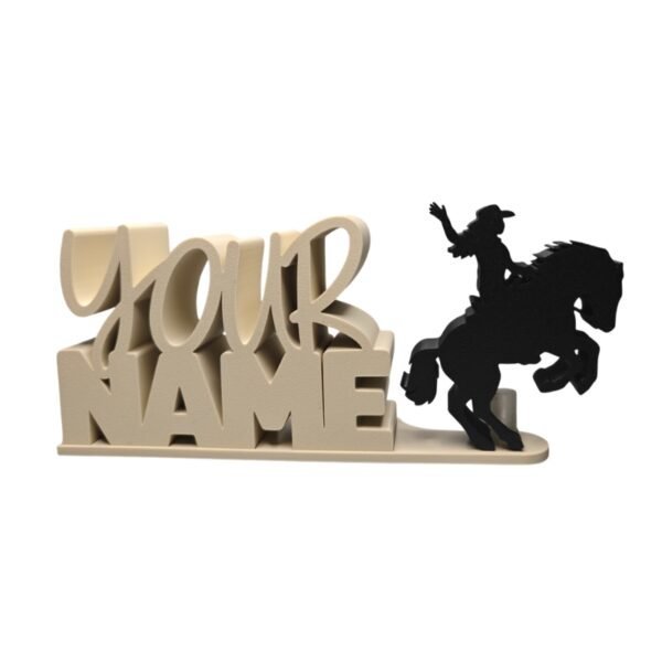 Cream stacked personalized Namelet featuring script lettering above bold block letters, paired with a black Bronco Rider Sidekick showing a cowboy riding a bucking horse.