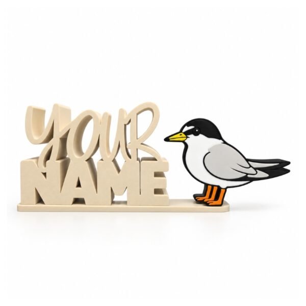 Personalized cream-colored stacked Namelet display featuring a California Least Tern SideKick with a black cap, white body, gray wings, yellow beak, and orange feet. 3D printed desk decor by Embellish Queen.