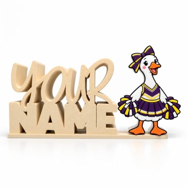 Personalized 3D printed Namelet desk sign featuring the Cheer Goose Sidekick in a purple and yellow cheerleading outfit with matching bow and pom-poms, by Embellish Queen.