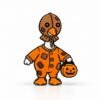 Goosebumps SideKick featuring a spooky-cute Halloween goose dressed in an orange patchwork costume with a stitched burlap mask, carrying a jack-o'-lantern candy bucket for festive Halloween desk decor.
