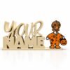 Personalized cream-colored YOUR NAME Namelet desk sign featuring the interchangeable Goosebumps SideKick, a Halloween goose wearing an orange patchwork costume and stitched mask while holding a jack-o'-lantern trick-or-treat bucket.