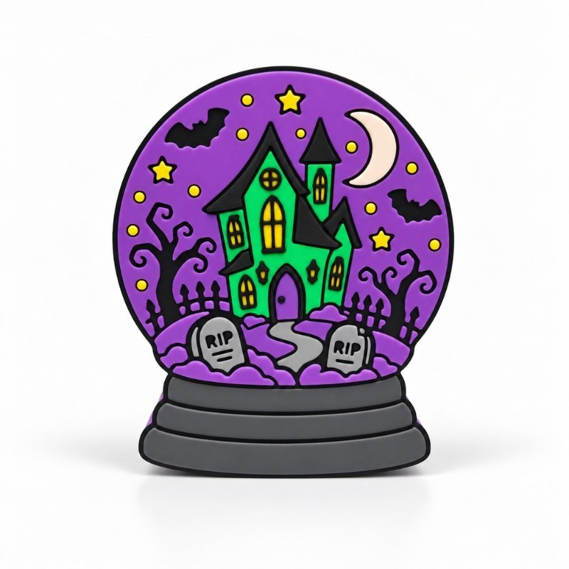 Haunted Snow Globe SideKick featuring a green haunted house, purple night sky, bats, crescent moon, stars, and spooky graveyard for Halloween Namelet decor.