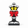 Holiday Lamp Post SideKick Holiday Lamp Post SideKick featuring a black Christmas street lamp with glowing yellow windows, white snow accents, and a festive red bow.