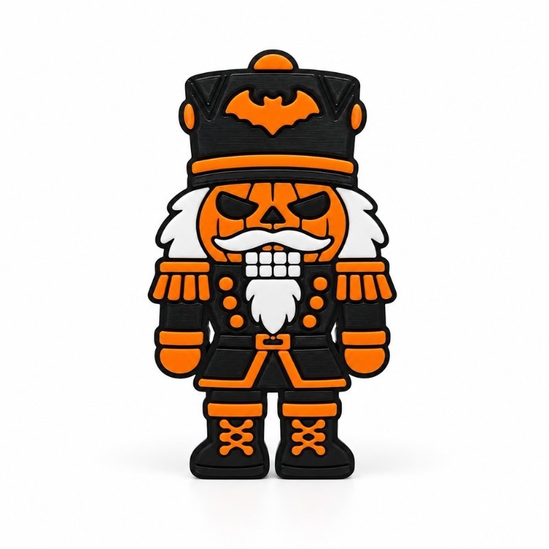 Jack-o-cracker Halloween SideKick featuring an orange jack-o'-lantern face, black nutcracker uniform with orange accents, white beard, and bat-decorated hat on a white background.