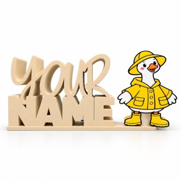 Personalized stacked Namelet desk sign in ivory with an interchangeable rainy day goose sidekick wearing a bright yellow raincoat, matching rain hat, and boots, by Embellish Queen.