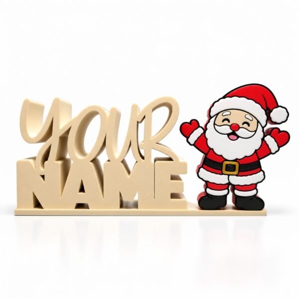 Personalized cream-colored YOUR NAME Namelet desk sign featuring the interchangeable Santa Claus SideKick with a cheerful Santa in a red suit and hat, perfect for Christmas desk decorations and holiday gifts.