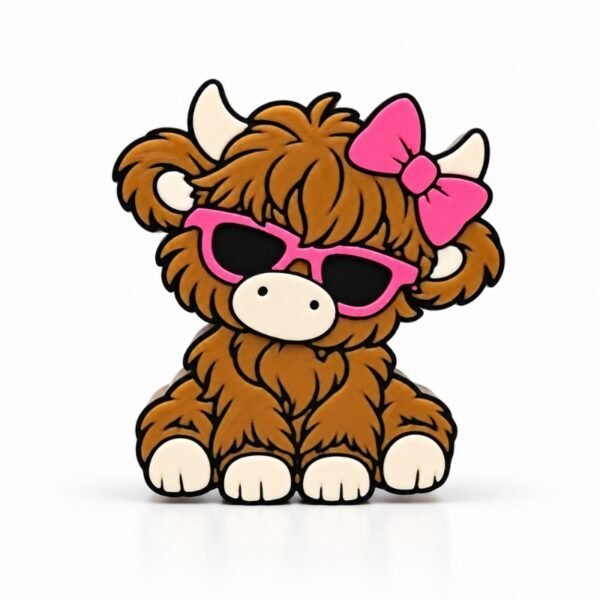 Sassy Highland Cow SideKick featuring a shaggy brown cow with pink sunglasses, matching pink bow, cream horns, and hooves. Interchangeable Namelet accessory.