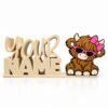 Personalized 3D printed Namelet desk sign with Sassy Highland Cow SideKick featuring pink sunglasses and bow. Custom interchangeable desk decor by Embellish Queen.