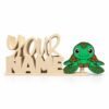 Sea Turtle SideKick Cream-colored personalized Namelet desk sign displaying "YOUR NAME" with a green sea turtle SideKick featuring brown shell details and spotted flippers.
