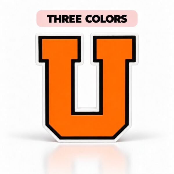 Varsity Letter SideKick Orange and black two-color Varsity Letter U SideKick featuring a bold orange letter with black outline, customizable for Embellish Queen Namelets.