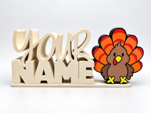Personalized “YOUR NAME” Namelet desk sign with a colorful turkey SideKick on a cream base.